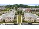 Aerial view of a townhome community, showcasing the lush landscaping and architectural details at 132 Grand Cres, Alpharetta, GA 30009