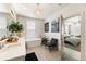 Bathroom with soaking tub, double vanity, and adjacent bedroom entrance at 132 Grand Cres, Alpharetta, GA 30009