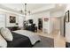 Bedroom with walk-in closet, office area, and black furnishings at 132 Grand Cres, Alpharetta, GA 30009