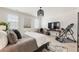 Calm bedroom with natural light, featuring neutral tones, minimalist decor, and wooden floors at 132 Grand Cres, Alpharetta, GA 30009