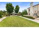 Beautiful brick townhome with a manicured lawn and gated front entrance in a well maintained community at 132 Grand Cres, Alpharetta, GA 30009