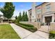 Beautiful brick townhome with a manicured lawn and gated front entrance in a well maintained community at 132 Grand Cres, Alpharetta, GA 30009