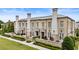 Charming brick townhomes featuring private patios and beautifully manicured landscaping at 132 Grand Cres, Alpharetta, GA 30009