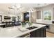 Open concept kitchen with large island, breakfast bar and stainless steel appliances at 132 Grand Cres, Alpharetta, GA 30009