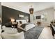 Spacious main bedroom features a modern color palette, contemporary lighting, and ample natural light at 132 Grand Cres, Alpharetta, GA 30009