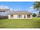Spacious backyard with lush lawn, privacy fence and mature trees at 4200 Vinca Way, Union City, GA 30291