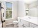 Cozy bathroom with shower, window, and storage at 4200 Vinca Way, Union City, GA 30291
