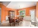 Inviting dining room with natural light, classic chandelier and exterior access at 4200 Vinca Way, Union City, GA 30291