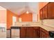 Kitchen featuring dark cabinetry, stainless steel dishwasher, and an open floorplan at 4200 Vinca Way, Union City, GA 30291