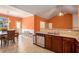 Bright kitchen with stainless steel appliances and view of dining room at 4200 Vinca Way, Union City, GA 30291
