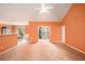 Spacious living room with an open layout, neutral carpet, and a partial wall to the dining room at 4200 Vinca Way, Union City, GA 30291