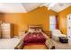 Spacious main bedroom featuring vaulted ceiling, carpet floors, a window, and natural light at 4200 Vinca Way, Union City, GA 30291