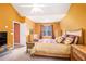 Spacious main bedroom featuring vaulted ceiling, carpet floors, a window, and natural light at 4200 Vinca Way, Union City, GA 30291