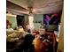 Bedroom with neutral walls, a ceiling fan, and natural light from a window at 3617 Bob White Ln, Loganville, GA 30052
