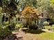 Quaint single-story house nestled in a wooded area, complete with a cozy front porch at 3617 Bob White Ln, Loganville, GA 30052
