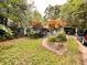 Cozy single-story home featuring a covered carport and a partially wooded front yard at 3617 Bob White Ln, Loganville, GA 30052