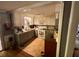 Traditional kitchen with white cabinets, laminate countertops, and essential appliances at 3617 Bob White Ln, Loganville, GA 30052