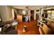 Bright living room with hardwood floors, built-in shelving, and an open layout at 3617 Bob White Ln, Loganville, GA 30052
