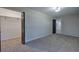 Spacious bedroom features neutral walls, carpet, and closet with open doorway for easy access at 380 Inman Rd, Fayetteville, GA 30215
