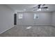 Bedroom featuring neutral walls, recessed lighting, and two windows allowing natural light at 380 Inman Rd, Fayetteville, GA 30215