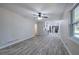 Open floorplan with gray wood floors that connect the living and kitchen areas at 380 Inman Rd, Fayetteville, GA 30215