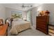 Cozy bedroom with a comfortable bed, soft lighting, and charming decor for restful nights at 5885 Millstone Dr, Cumming, GA 30028