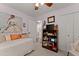 Bedroom with Queen bed, wooden floors, and closet at 5885 Millstone Dr, Cumming, GA 30028