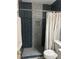 Modern bathroom featuring a stylish tiled shower and updated fixtures at 6658 Ramsgate Way, Norcross, GA 30093