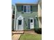 Charming home with a well-kept lawn and tidy shrubbery enhancing curb appeal at 6658 Ramsgate Way, Norcross, GA 30093