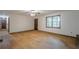 Well-lit bedroom with hardwood floors and a large window, providing comfortable living at 109 Amberidge Nw Dr, Cartersville, GA 30121
