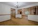 Spacious dining area with chandelier, hardwood floors, offering an open layout at 109 Amberidge Nw Dr, Cartersville, GA 30121