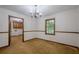 Bright dining room with hardwood floors and chandelier, ideal for entertaining at 109 Amberidge Nw Dr, Cartersville, GA 30121