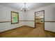 Hardwood floors featured in dining room with kitchen views, perfect for intimate gatherings at 109 Amberidge Nw Dr, Cartersville, GA 30121
