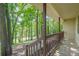 Inviting front porch surrounded by lush greenery and offering a serene outdoor space at 109 Amberidge Nw Dr, Cartersville, GA 30121
