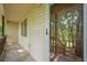 Covered front porch offering views of the property, and a secure front door at 109 Amberidge Nw Dr, Cartersville, GA 30121