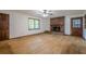 Bright living room features fireplace, hardwood floors, and natural light through large windows at 109 Amberidge Nw Dr, Cartersville, GA 30121