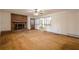 Spacious living room with fireplace and hardwood floors, bathed in natural light at 109 Amberidge Nw Dr, Cartersville, GA 30121