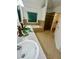 Bathroom with double sinks, separate tub, and glass-enclosed shower at 2479 Mitford Ct, Dacula, GA 30019