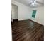 Bright bedroom with nice floors, a window, and a walk-in closet with shelves at 2479 Mitford Ct, Dacula, GA 30019