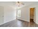Bedroom with new floors, ceiling fan, a closet, and window at 2479 Mitford Ct, Dacula, GA 30019