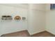 Walk-in closet featuring carpet flooring, white walls, and wire shelving for optimal storage solutions at 2479 Mitford Ct, Dacula, GA 30019