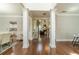 Inviting foyer with hardwood floors leading to the living room and kitchen at 2479 Mitford Ct, Dacula, GA 30019