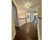 Upstairs hallway with hardwood floors and views of various rooms, including closet and bedroom at 2479 Mitford Ct, Dacula, GA 30019