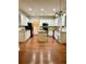 Bright kitchen featuring white cabinetry, granite countertops and a central island for added workspace at 2479 Mitford Ct, Dacula, GA 30019