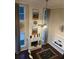 A top-down view of the living room featuring a fireplace, fan, and artwork at 2479 Mitford Ct, Dacula, GA 30019