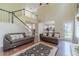 Open living area with high ceilings, staircase, and backyard access at 2479 Mitford Ct, Dacula, GA 30019
