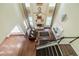 Aerial view showcasing living room with high ceilings, fireplace, and hardwood floors at 2479 Mitford Ct, Dacula, GA 30019