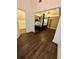 View into main bedroom showing hardwood floors, tray ceiling and four poster bed at 2479 Mitford Ct, Dacula, GA 30019