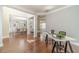Well-lit home office with hardwood floors and views into the dining area at 2479 Mitford Ct, Dacula, GA 30019