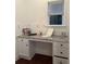 Bright workspace features a granite countertop desk space and natural lighting at 2479 Mitford Ct, Dacula, GA 30019